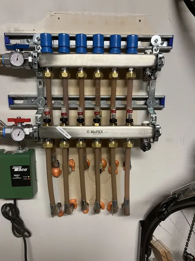 Plumber performing Leak Detection at a residential property in Winthrop Town