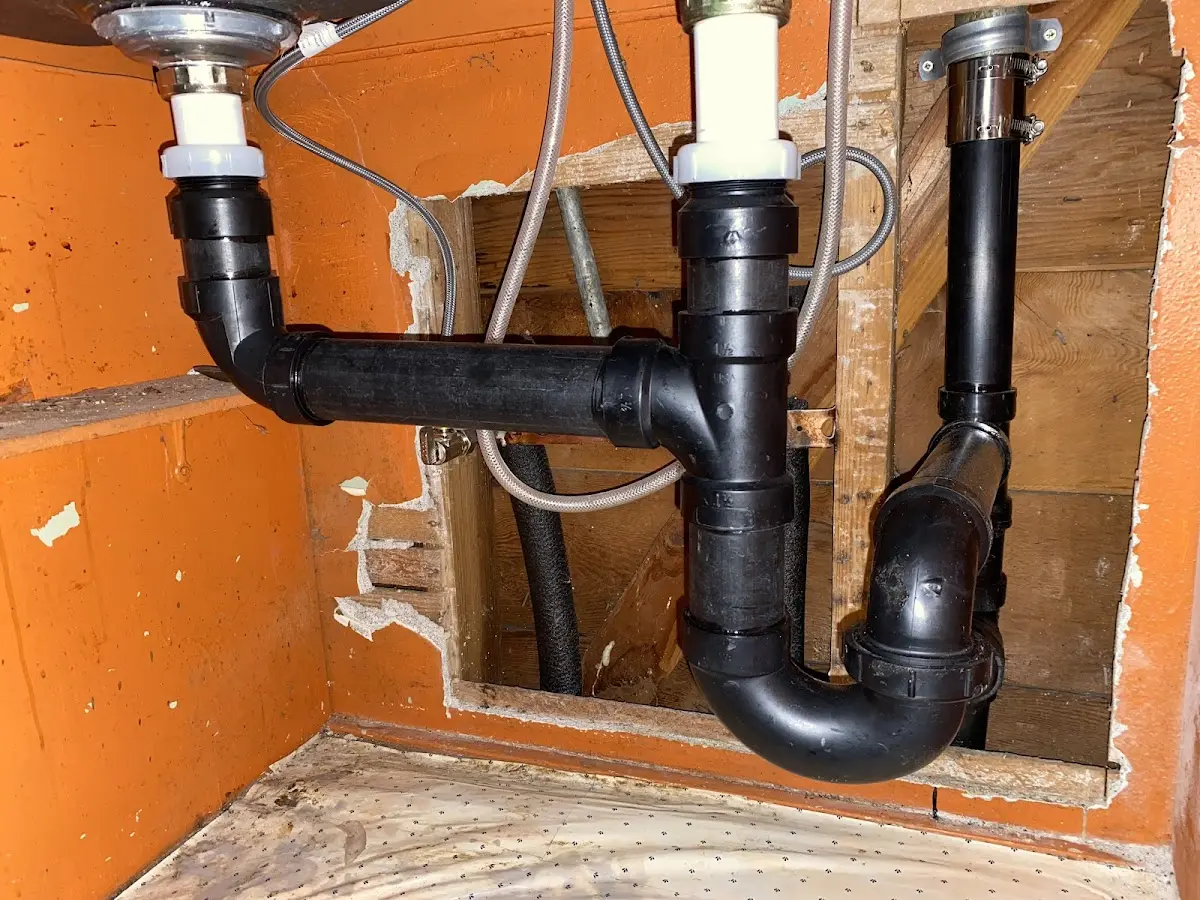 Professional Garbage Disposal Repair equipment and tools on the job in Winthrop Town